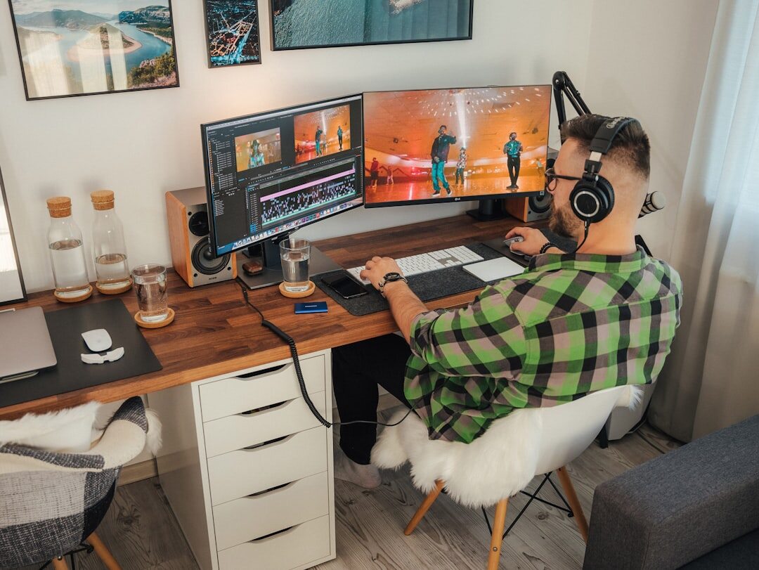 Portrait of a European video editor working at a desk